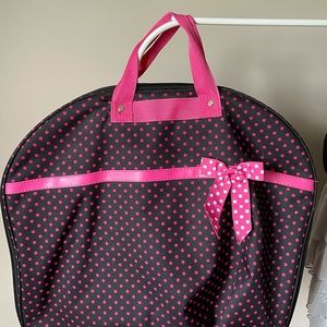 Black and pink polka dot garment bag